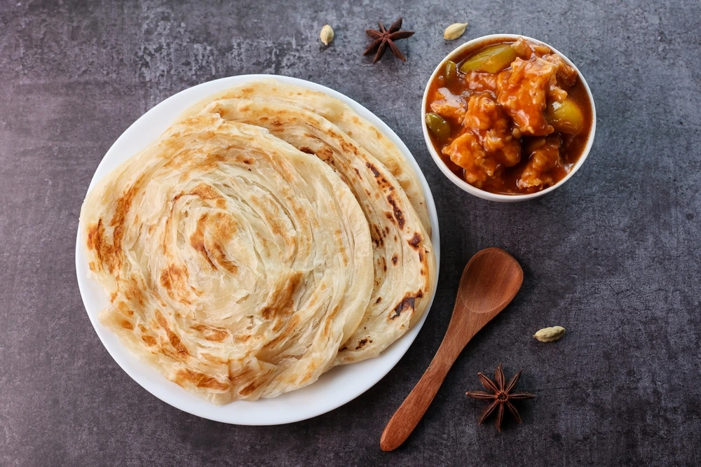 Kerala Parotta Recipe: The Flaky, Layered Delight You Can’t Resist
